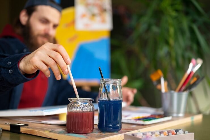 Professional painter working in studio